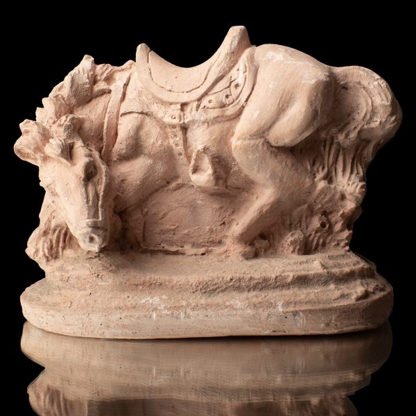 Caballo recostado