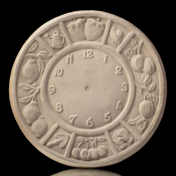 Plato en forma de reloj de frutas